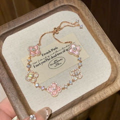 ピンク貝殻×四つ葉クローバーの幸運ブレスレット