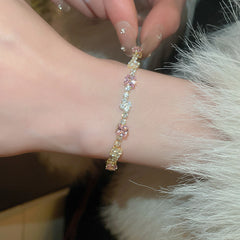 ピンクの四角形のエレガントなブレスレット