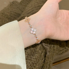 ピンク貝殻×四つ葉クローバーの幸運ブレスレット