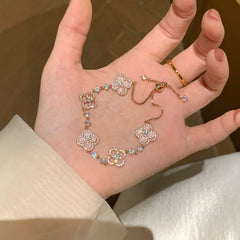 ピンク貝殻×四つ葉クローバーの幸運ブレスレット