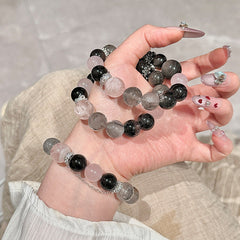 天然水晶の黒いフラッシュリングと雪の花幽霊のブレスレット